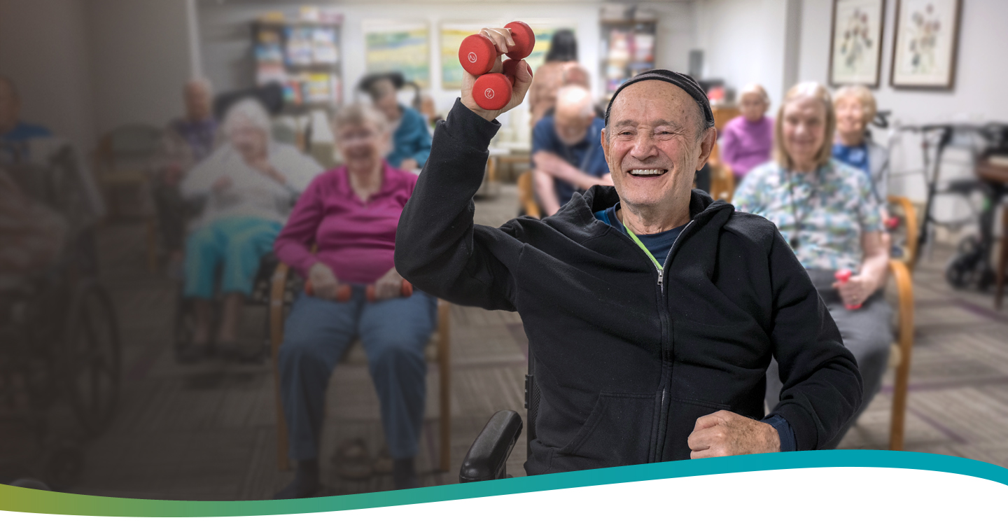 Resident participating in a modified fitness class at Atrium Retirement Residence in Orillia